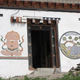 Illustration for article titled In Bhutan, friendly phalluses painted on houses scare off evil spirits (NSFW)
